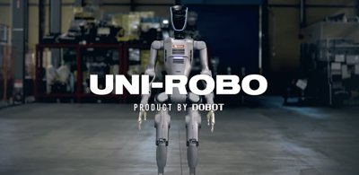 The DOBOT ATOM humanoid robot, branded as UNI-ROBO, standing in a workshop environment.