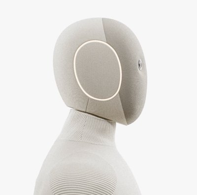 1X's humanoid robot companion providing assistance to an elderly person