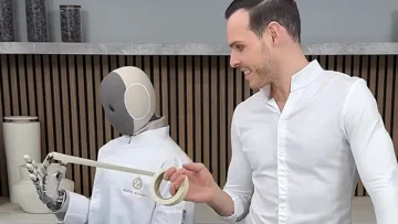 1X NEO robot sztárséffel süt süteményt